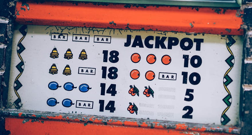 An Old Jackpot Fruit Machine Printed on a Wall