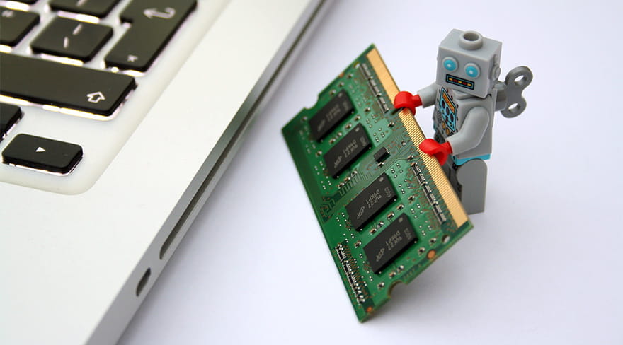 Computer Bot Holding a Software Chip